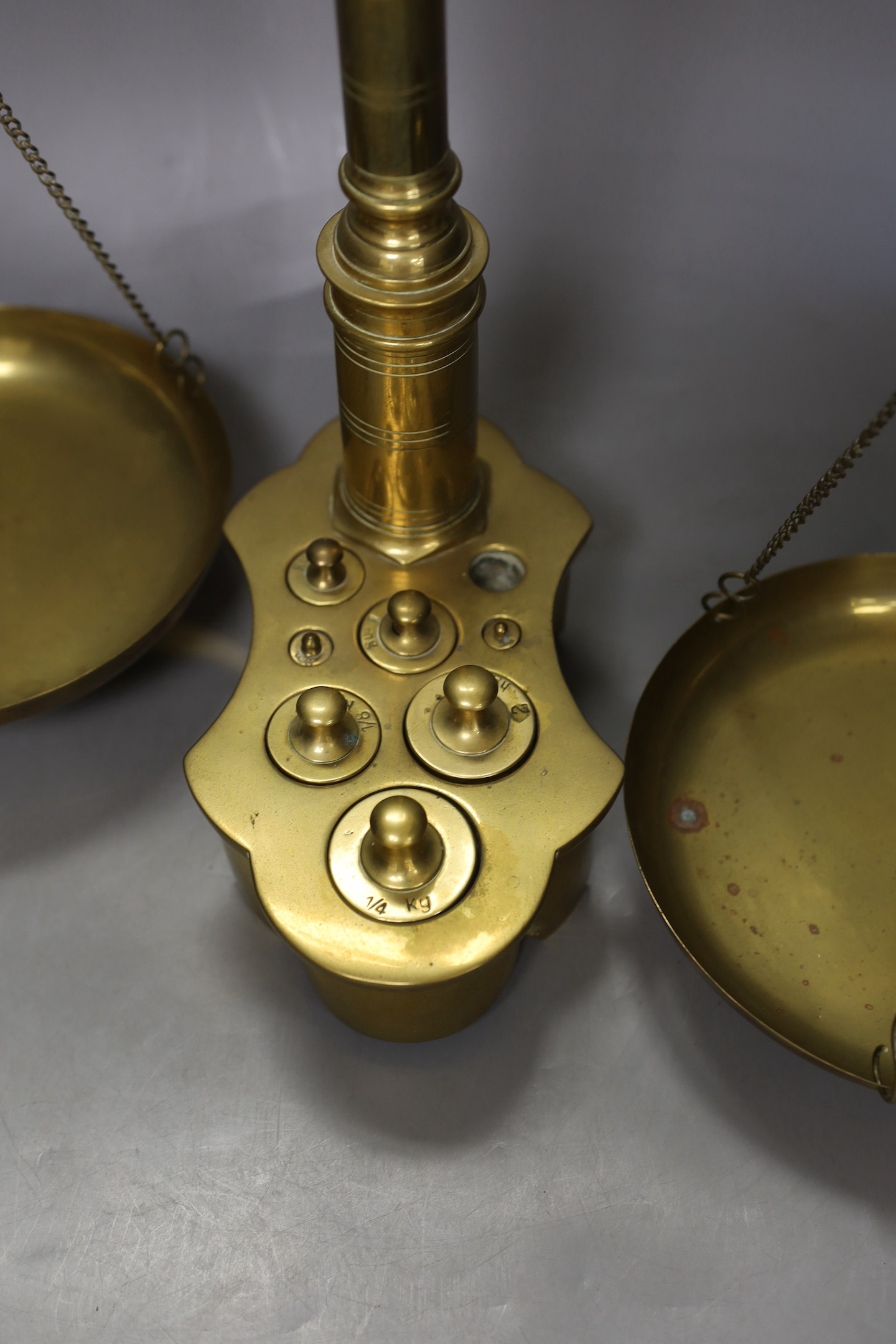 A pair of Victorian beam scales, 55cm tall, and a Smith & Day timepiece